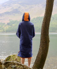 Load image into Gallery viewer, Lifestyle image of the back of a navy Selkie recycled robe